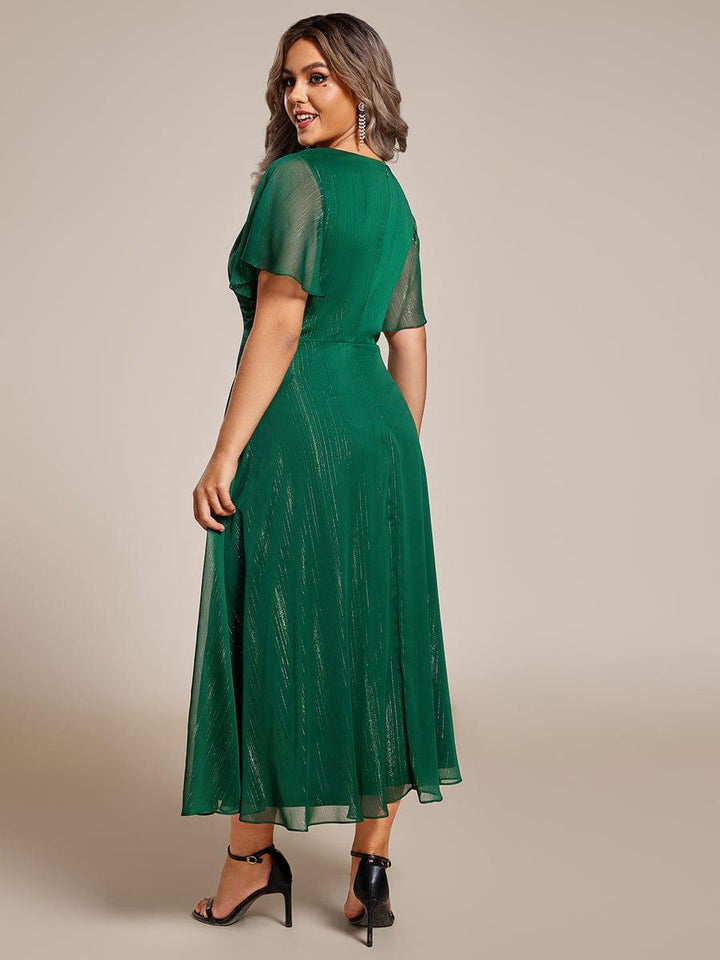 pretty OPAHL|Plus Size Silver Metallic Fabric V-Neck A-Line Wedding Guest Dress featuring Delicate Ruffled Hem