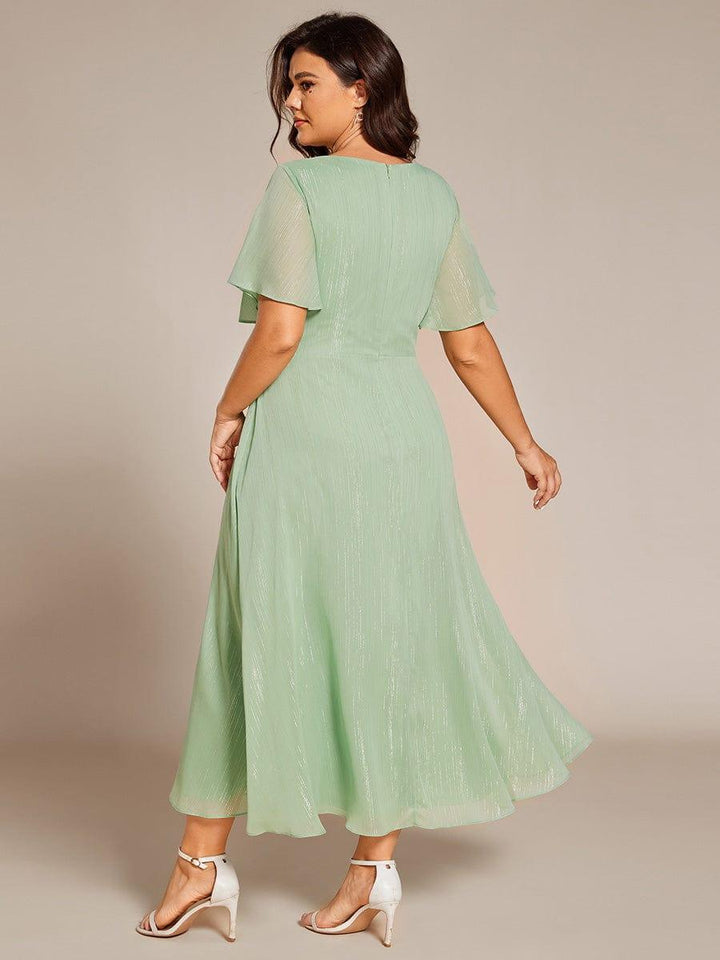 pretty OPAHL|Plus Size Silver Metallic Fabric V-Neck A-Line Wedding Guest Dress featuring Delicate Ruffled Hem